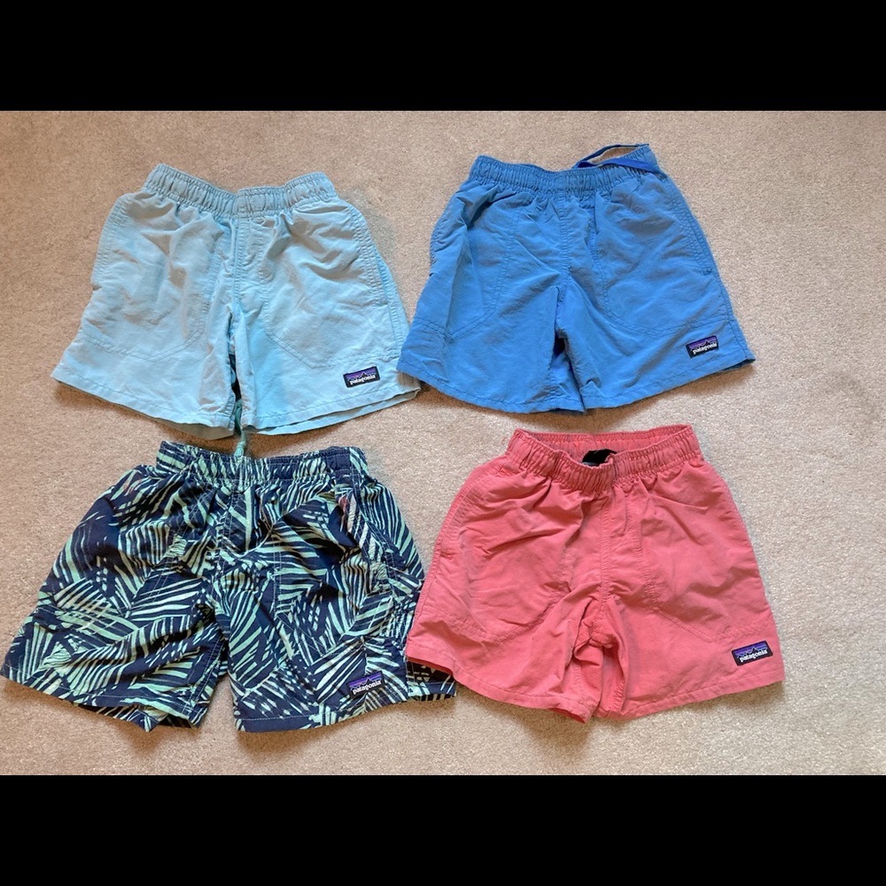 4 pairs/ bundle of used Patagonia boys swim trunks size xs.